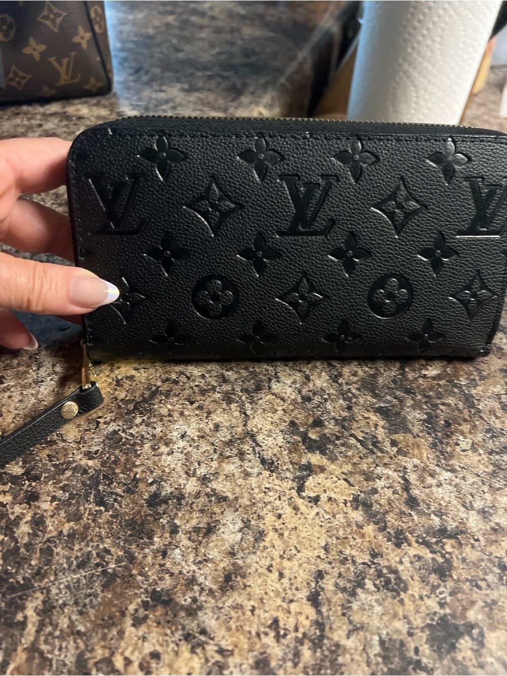 Black Embossed Monogram Zippy Wallet